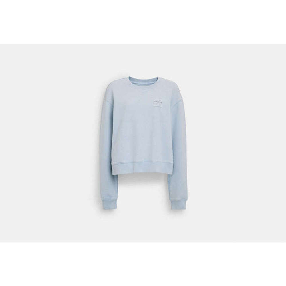 SOLD:  COACH SWEATSHIRT